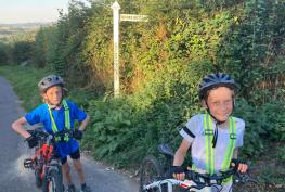 Dad and sons take on 180-mile bike ride to fundraise for charity