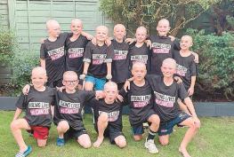 Head shave friends show Harry he's not alone in his fight against cancer