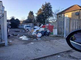 Residents hit out at 'eyesore' rubbish pile behind Slough flats