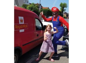 Burnham postman dresses up for deliveries to raise money for Britwell Youth Centre