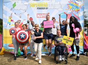 Four thousand superheroes fly through Dorney Lake for disability triathlon