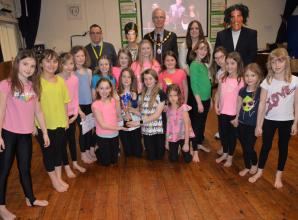 Schoolchildren sing Sixties hits for music competition