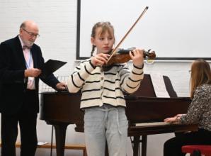 Children show confidence in playing for each other