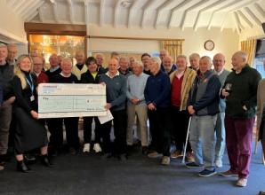 Golfers raise £5,800 for charity