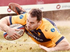 Bello hat-trick helps Hawks maintain unbroken league campaign