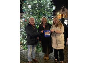 MP switches on lights to Twyford's Tree of Christmas Wishes