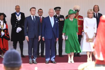 King Charles III greets Emmanuel Macron in Windsor at start of France state visit