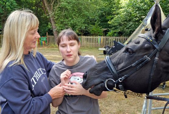 Horsing around: Racehorse visits children&rsquo;s special needs day centre