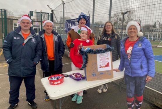 Maidenhead Hockey Club members donate items to Maidenhead Foodshare