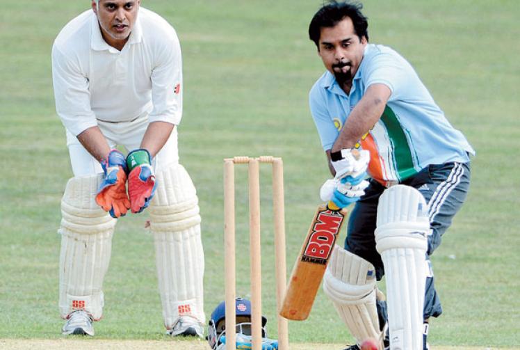 In pictures: Community forum members battle it out in cricket match