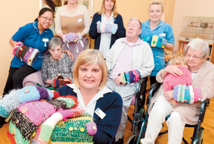 Maidenhead Loving Hands donate knitted 'twiddlemuffs' to St Mark's nursing home Maidenhead