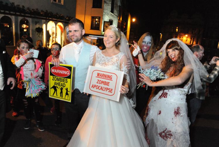 Zombies crash couple's wedding photos in the shadows of Windsor Castle