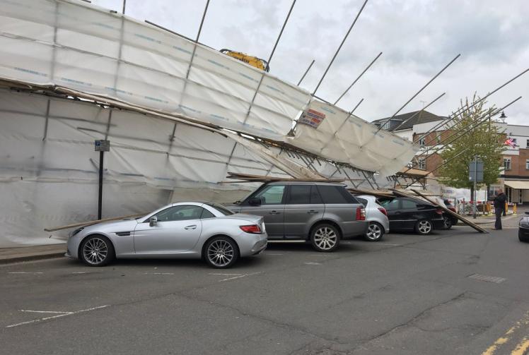 Colonnade demolition scaffolding collapses on cars