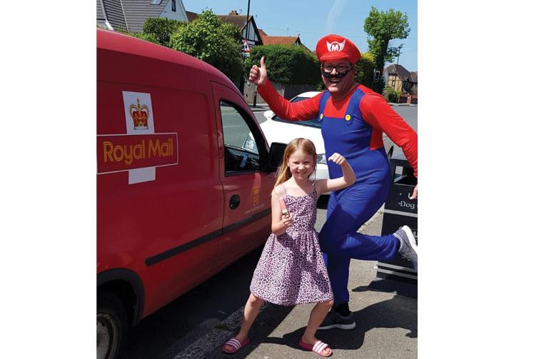 Burnham postman dresses up for deliveries to raise money for Britwell Youth Centre