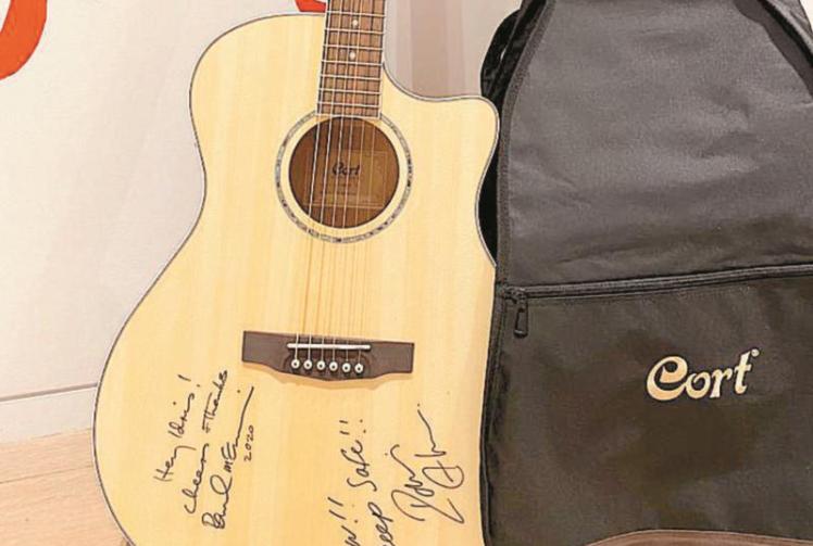 Idris Elba guitar signed by Paul McCartney sold by Maidenhead auctioneer