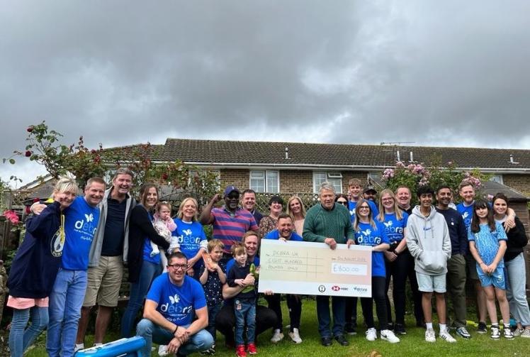 Maidenhead Spurs supporters' club make charity donation to DEBRA UK