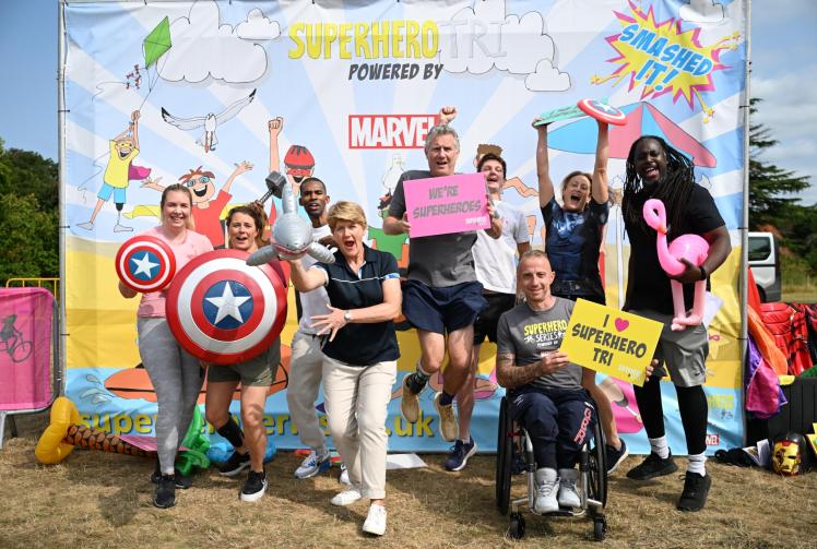 Three thousand superheroes fly through Dorney Lake for disability triathlon