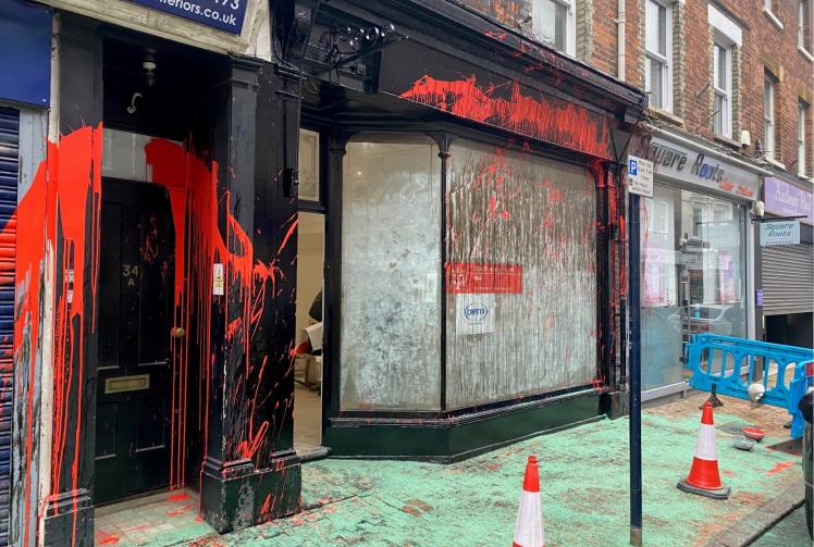 Queen Street businesses 'shocked' after vandals target them with red paint