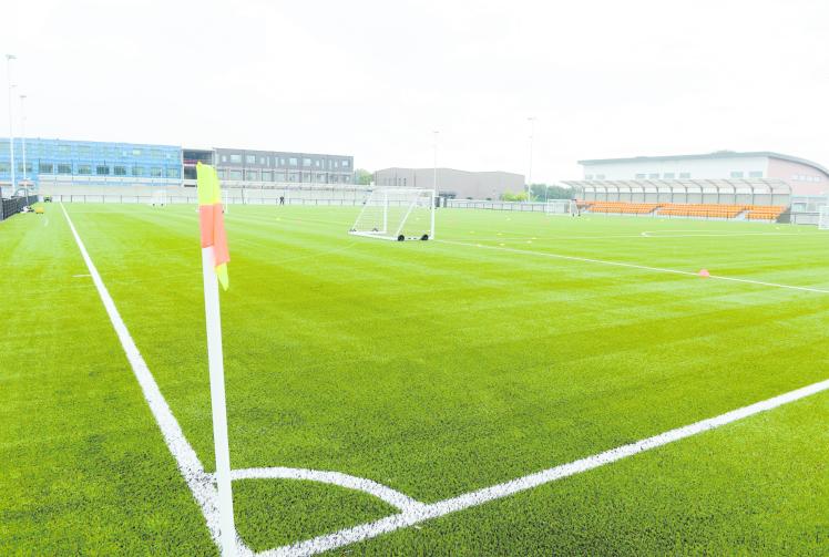 Slough Town sign experienced defender Reiss Greenidge