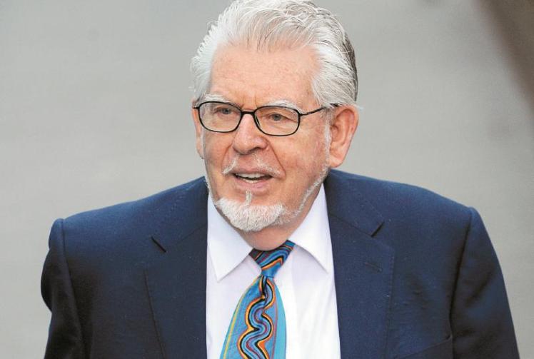 Rolf Harris' neighbour dismisses reports people are selling up because of disgraced star