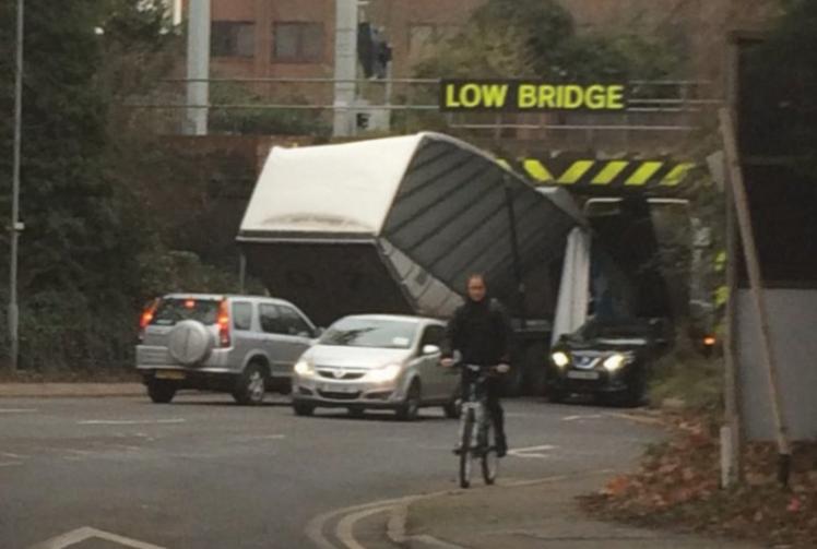 Lorry hits bridge by Langley Railway Station