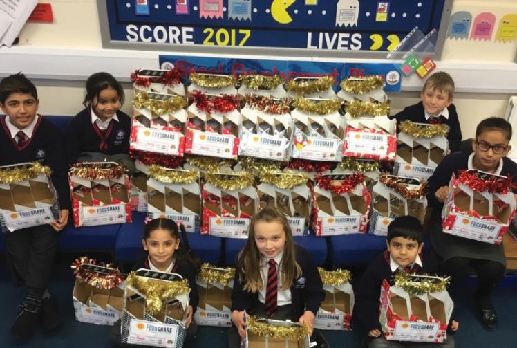 Riverside Primary pupils make gift boxes for families in need Photo 1