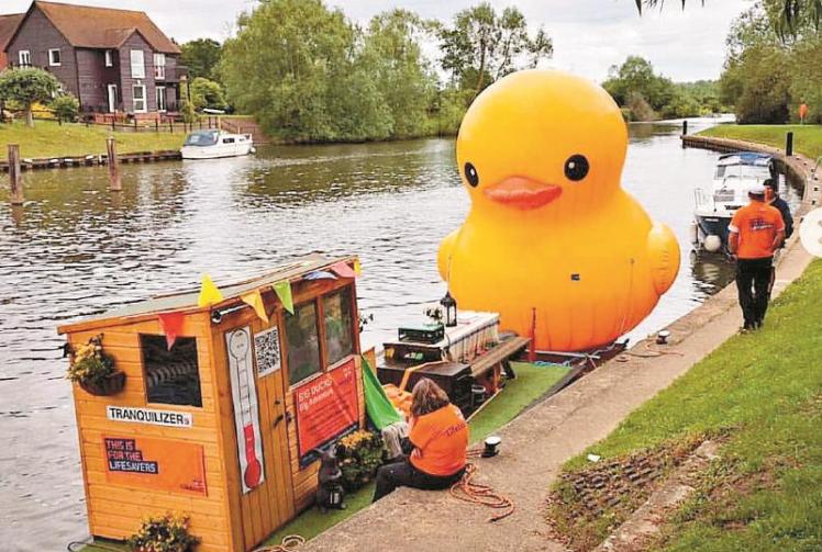 Giant rubber duck Lily is taken on a tour of the Thames