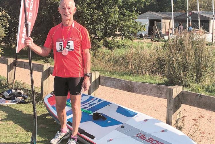 MAC's Waterman tries his hand at paddleboarding in Dinton Pastures
