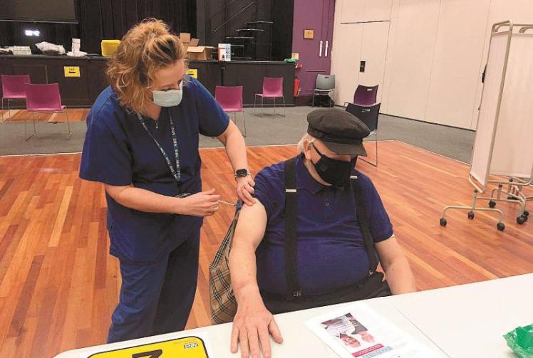 Hope in sight with vaccination centres open and promise of new vaccine