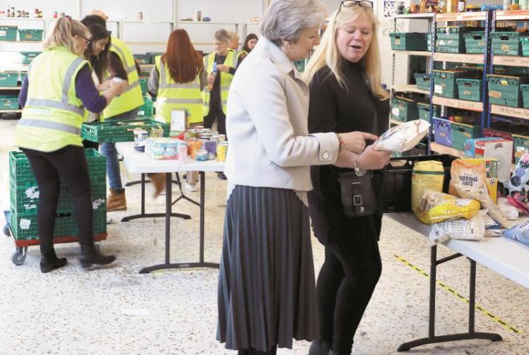 Theresa May 'surprised' by how Maidenhead Foodshare has grown during visit
