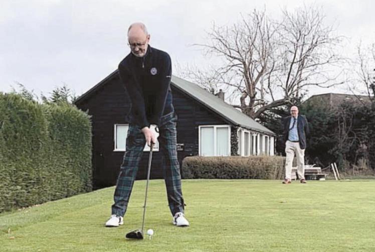 Brian Aldridge drives off as Maidenhead Golf Club's new captain