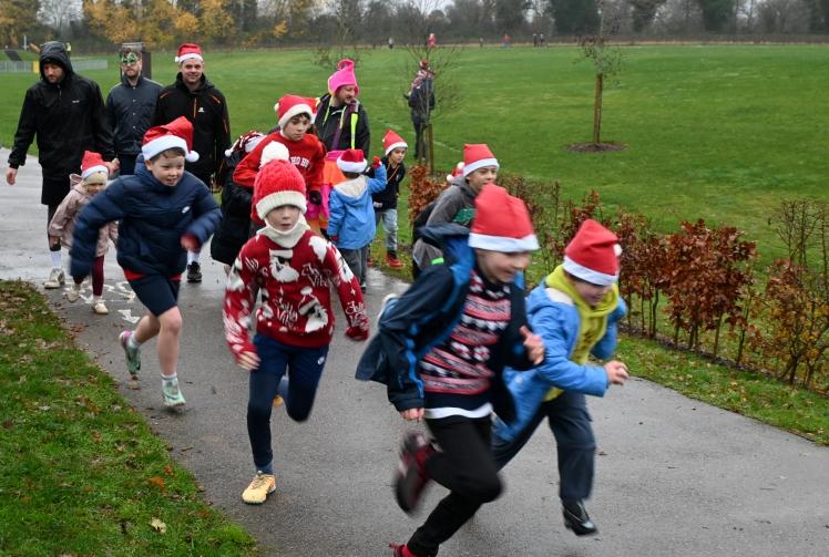 Santas take on Sunday stroll