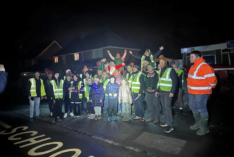 Santa with snow machine spreads festive cheer