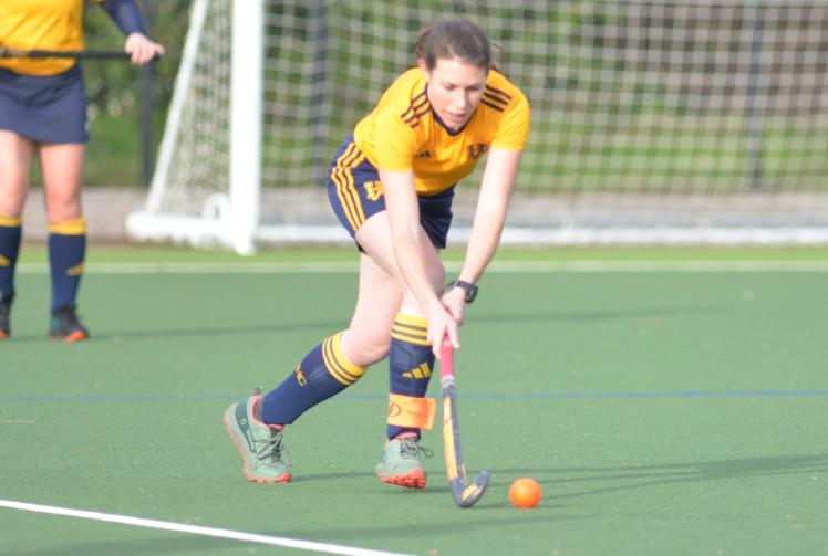 Bayfield treble helps league leaders defeat county rivals