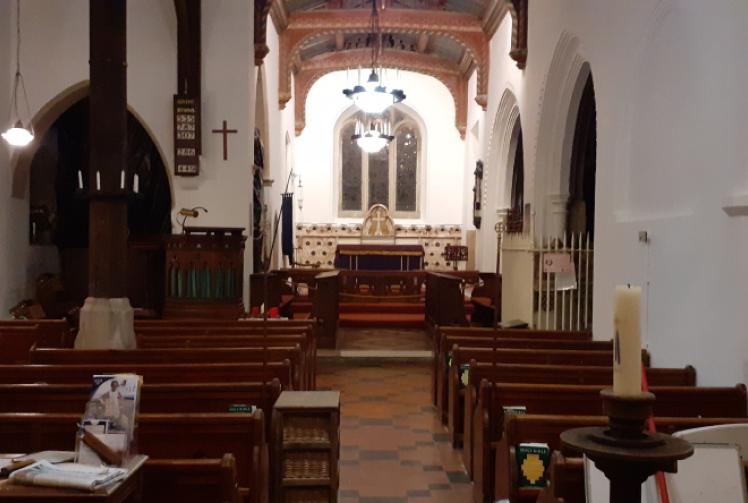 Church reopens after redecoration with candlelit service