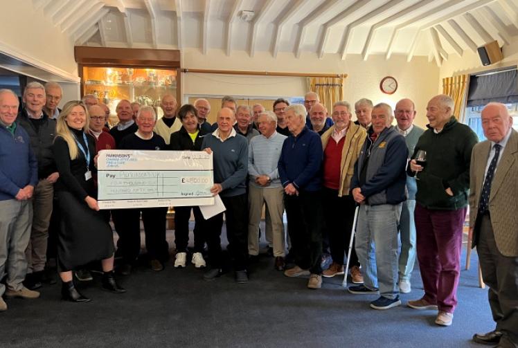 Golfers raise £5,800 for charity