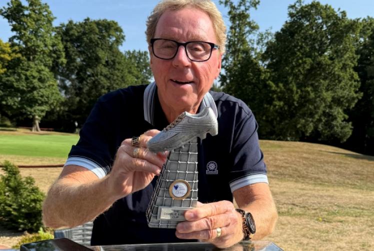 School tournament trophy signed by soccer supremo